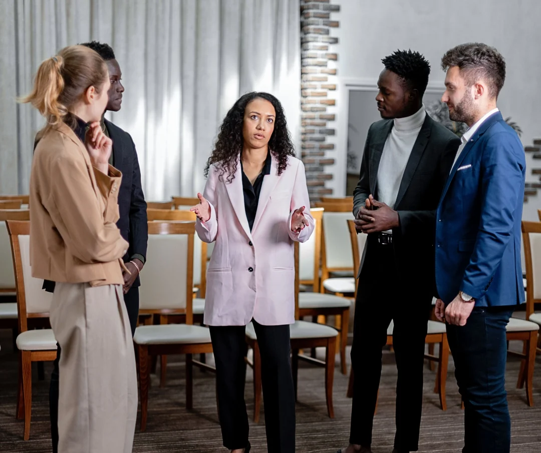 An advisor talking through coverage options with a small group of clients